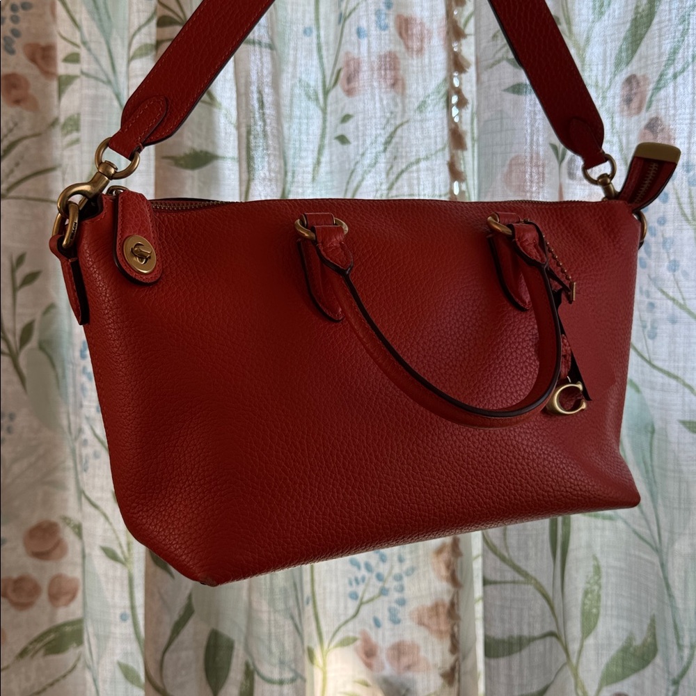 Bright orange coach bag